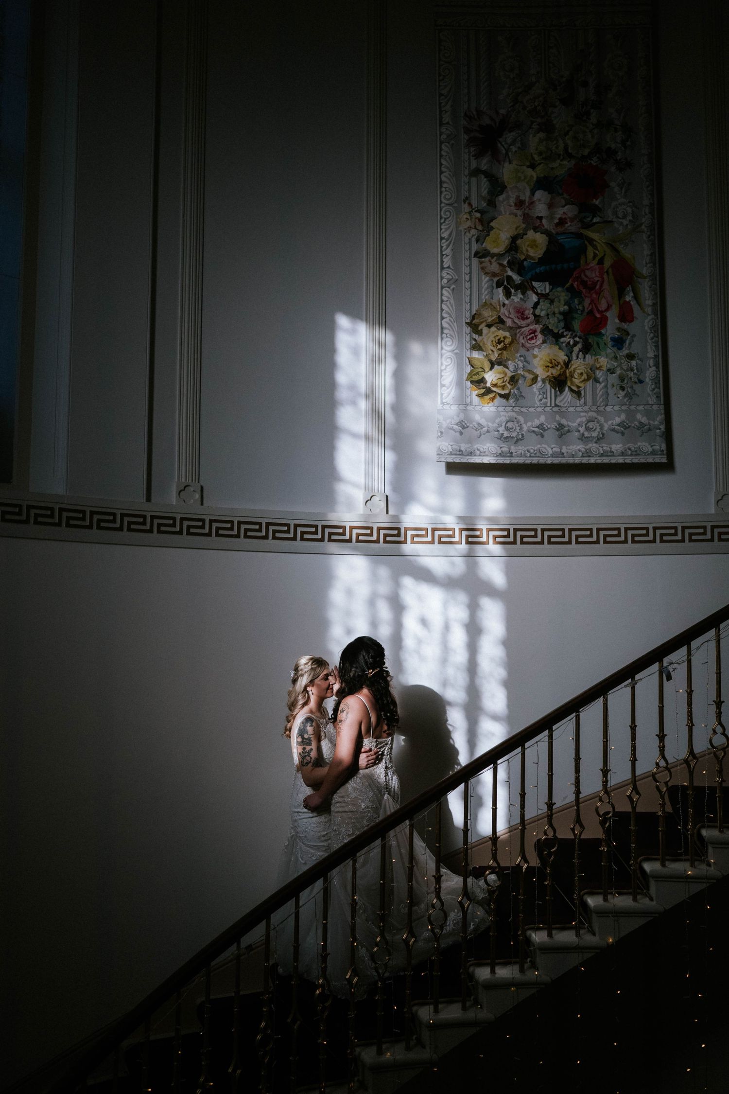 Aberdeen Wedding Photography. Dramatic black and white staircase scene with moody lighting and decorative wall details.