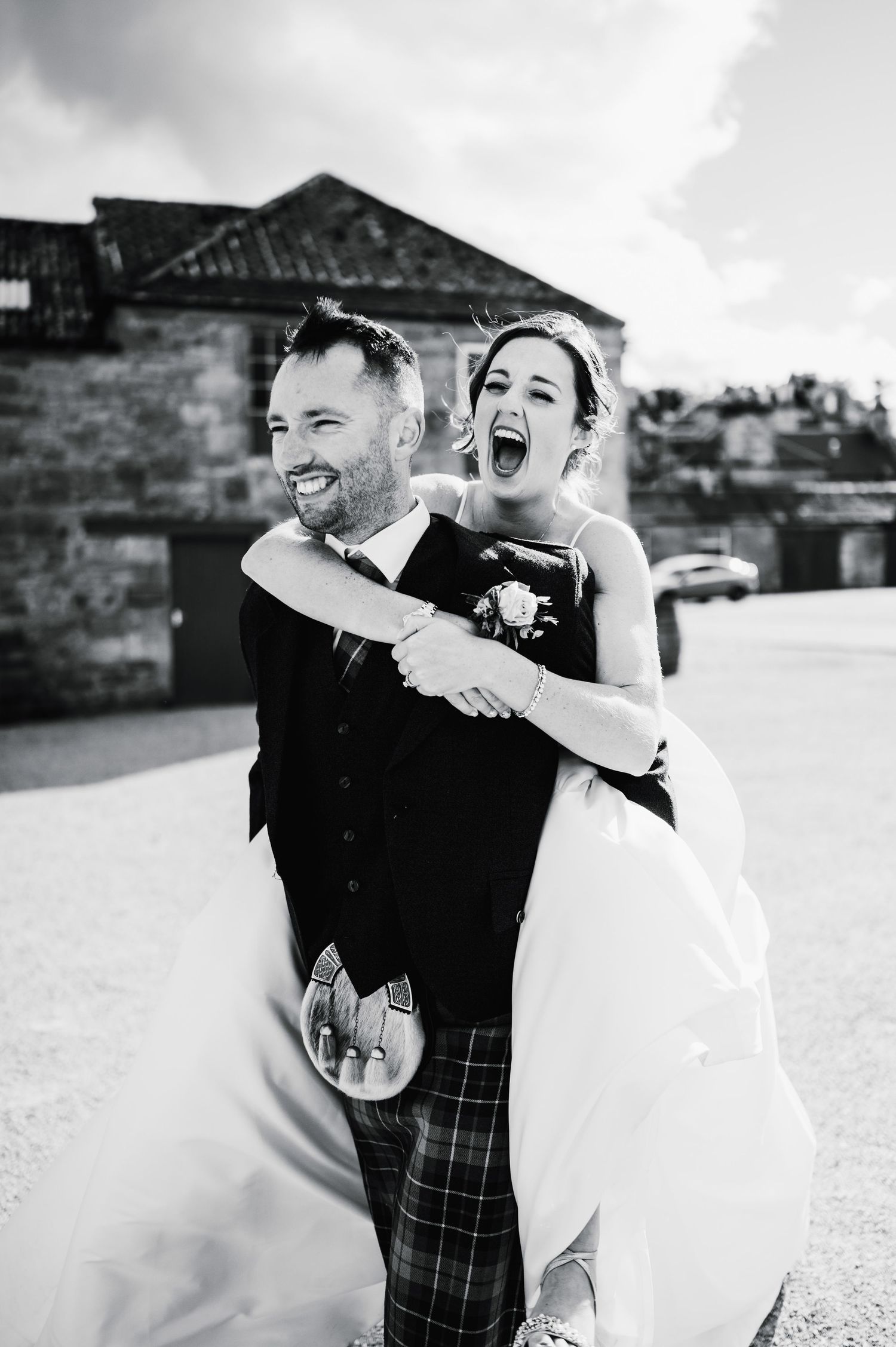 Black and white wedding photo sequence showing a couple sharing joyful candid moments together outdoors.