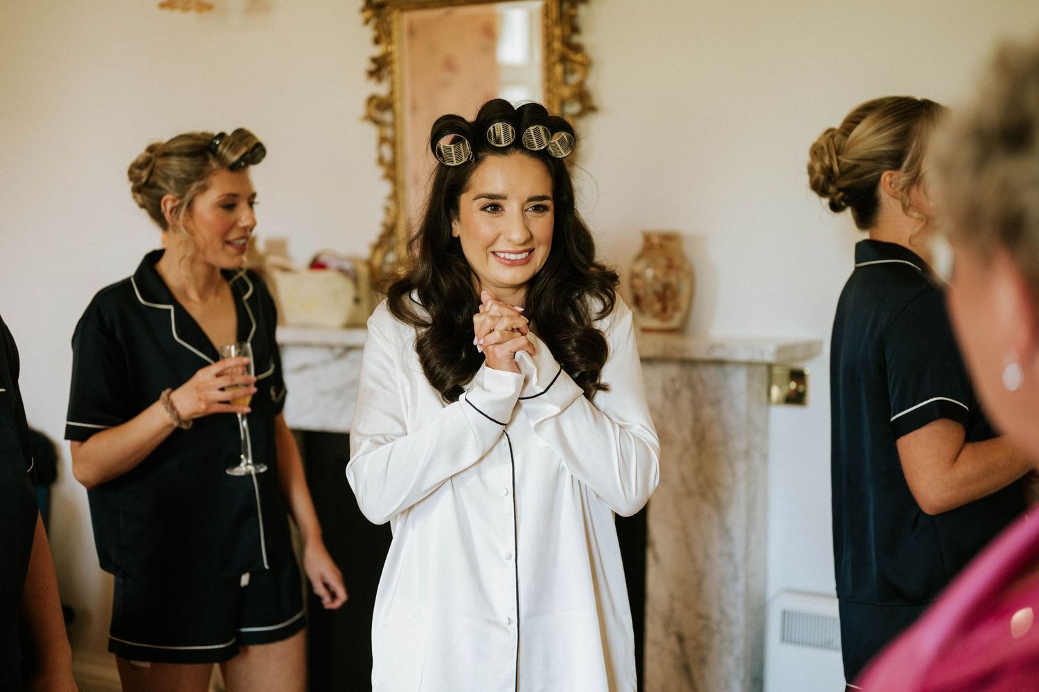 Wedding morning preparations in a bright room with elegant decor.