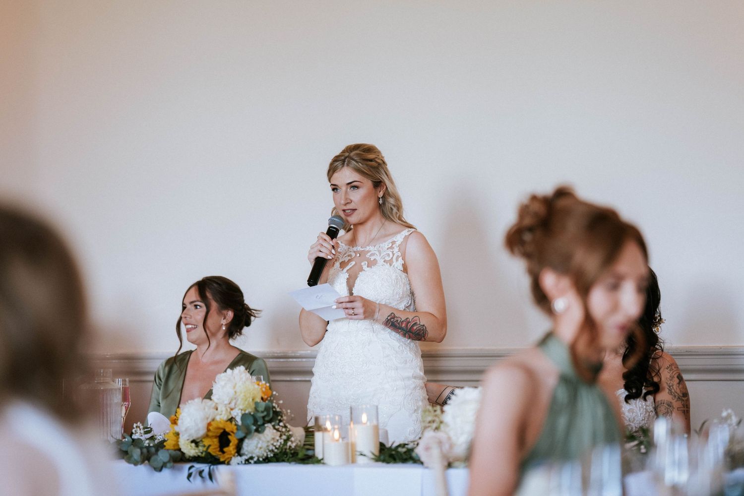 Fasque Castle Wedding Photography. Wedding reception dinner scene with elegant table settings and candlelight.