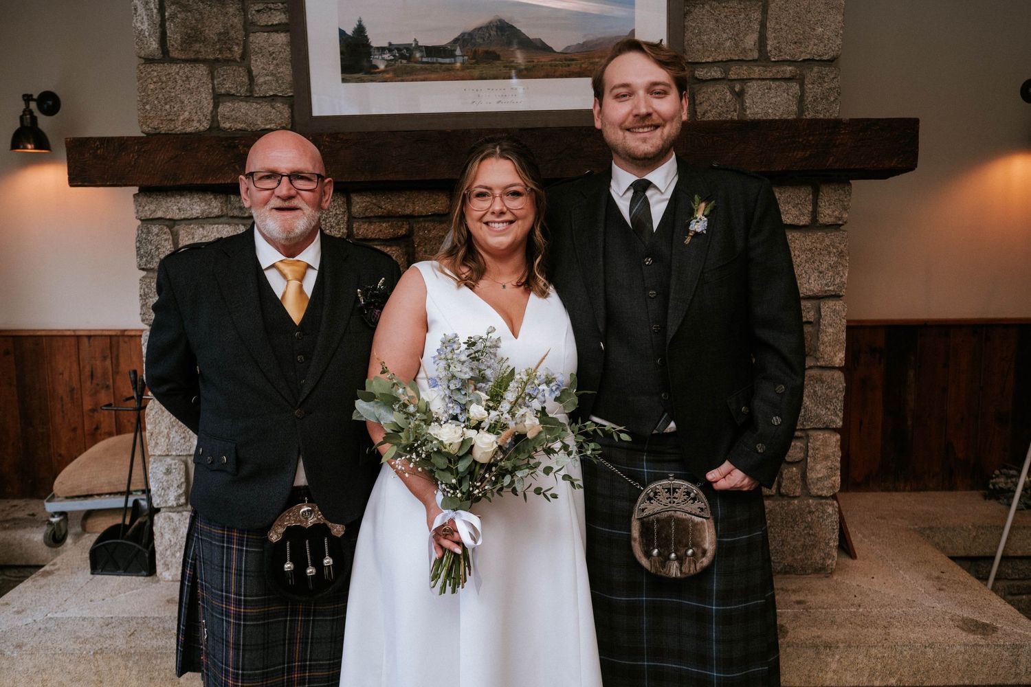 Elegant indoor wedding ceremony with stone walls and warm lighting.