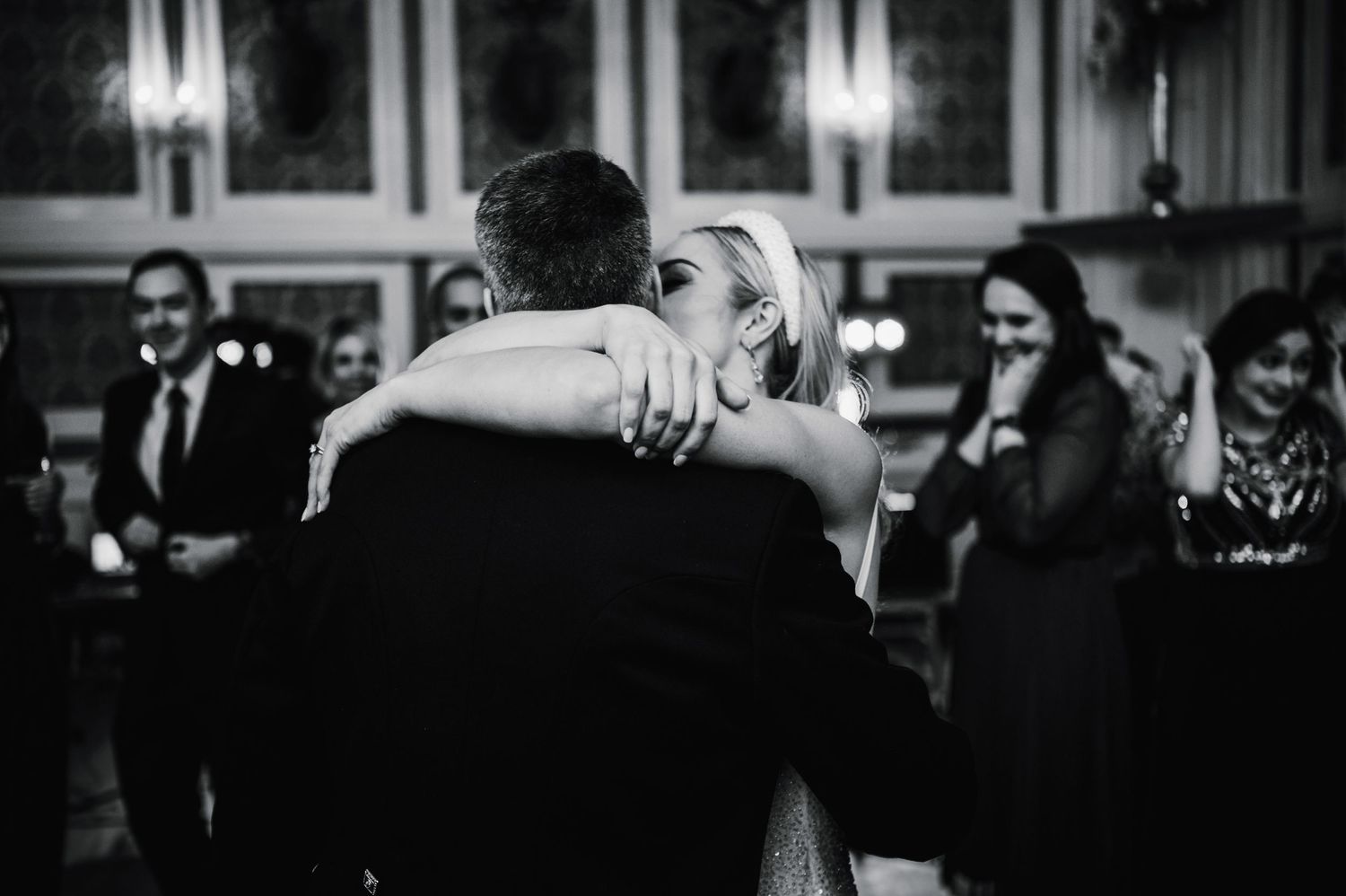 Black and white photo of an intimate dance moment during an evening celebration.