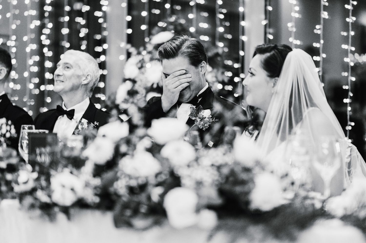 Aberdeen Wedding Photography. Wedding reception decorated with hanging fairy lights creating a magical atmosphere.