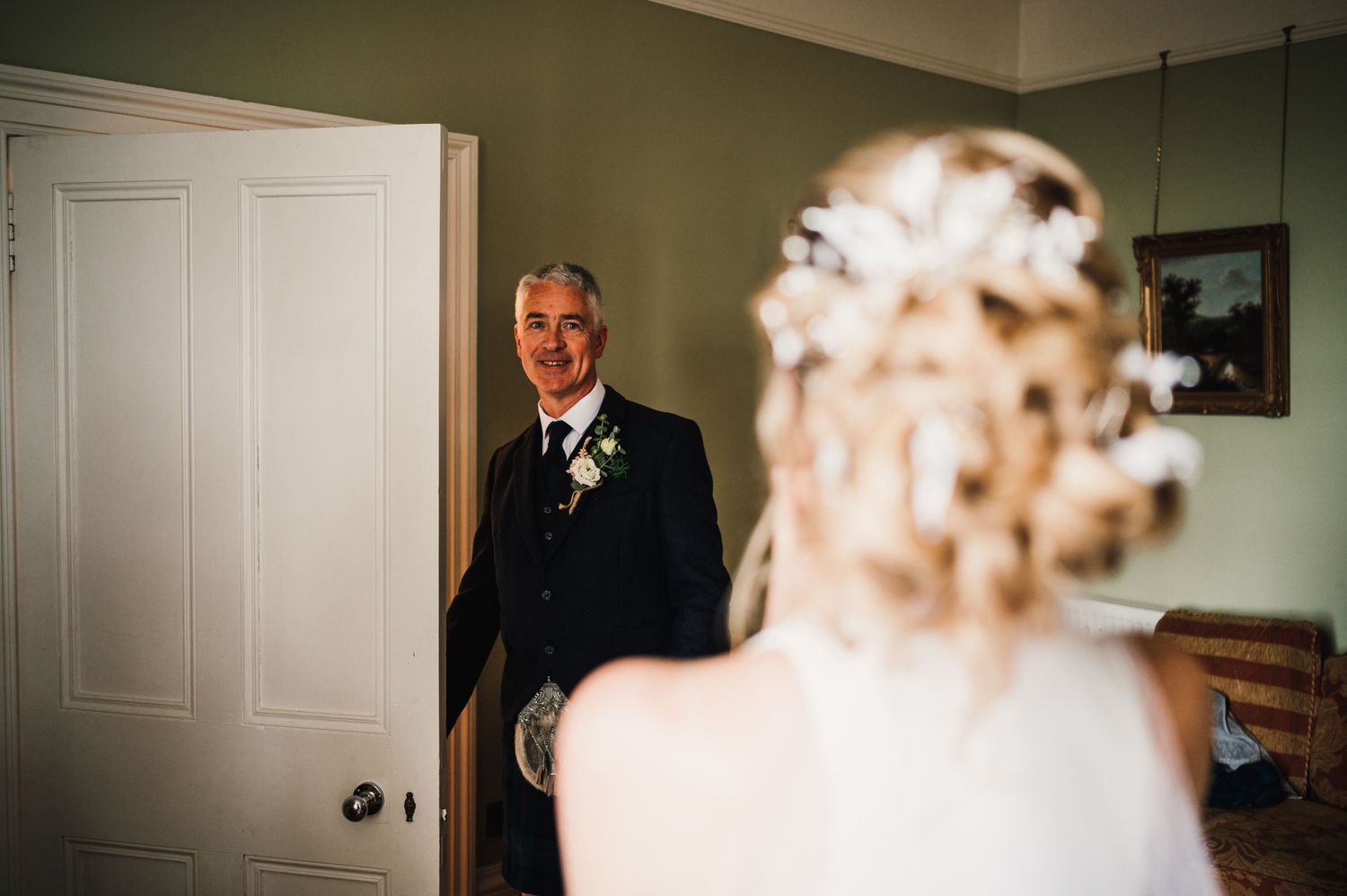 An emotional first look moment between two people during a wedding day.