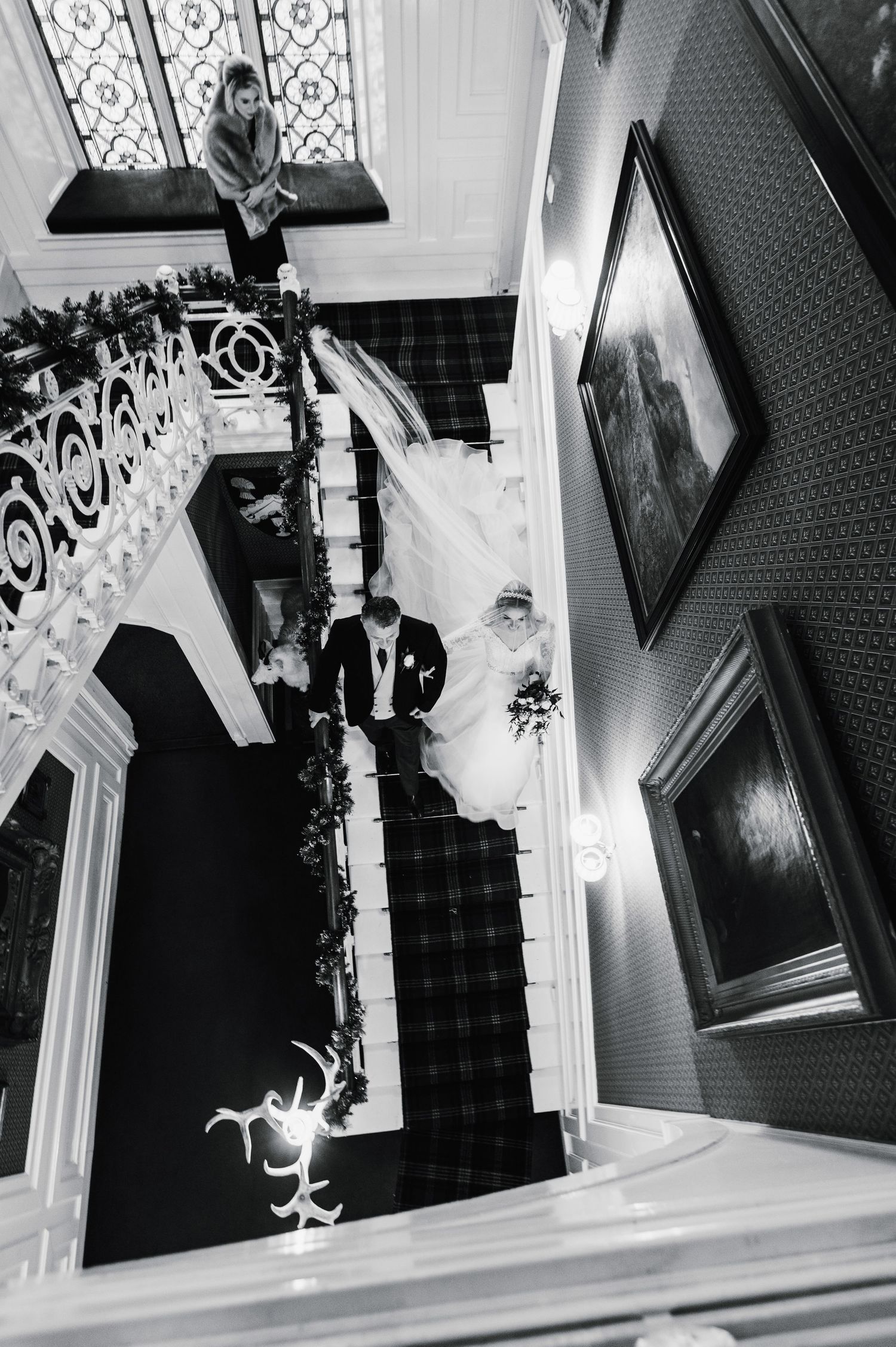 Aberdeen Wedding Photography. Black and white architectural shots of an ornate staircase with decorative railings.