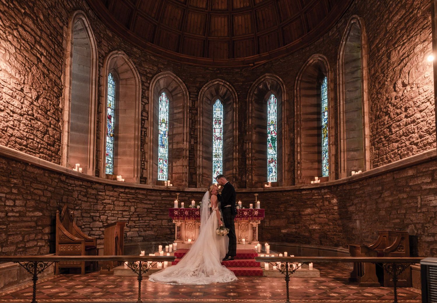 Aberdeen Wedding Photography. Interior panorama of a historic brick church with vaulted ceilings and stained glass windows.