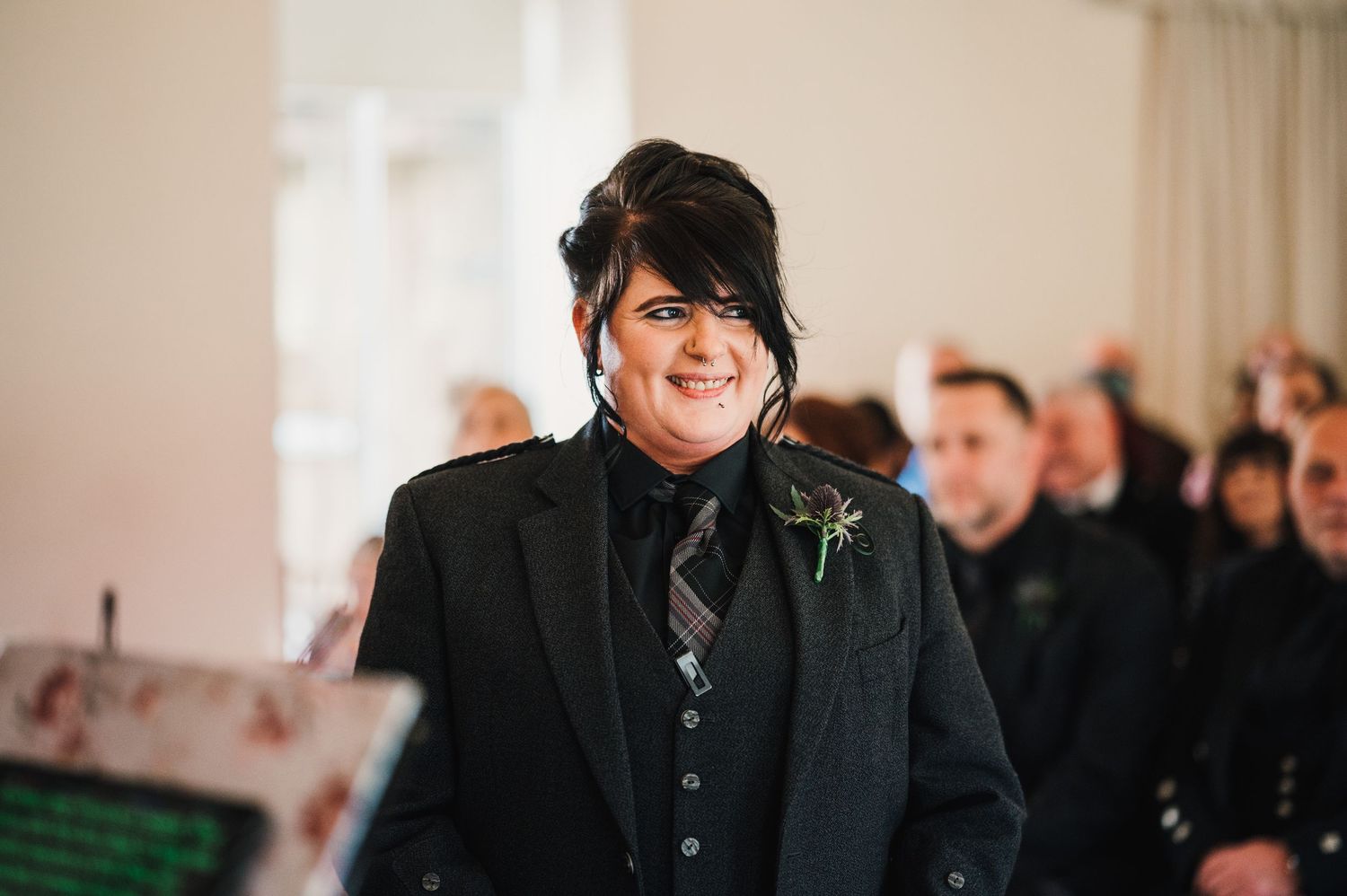 Logie House Wedding Photography. Wedding guests mingling at an elegant indoor reception venue.
