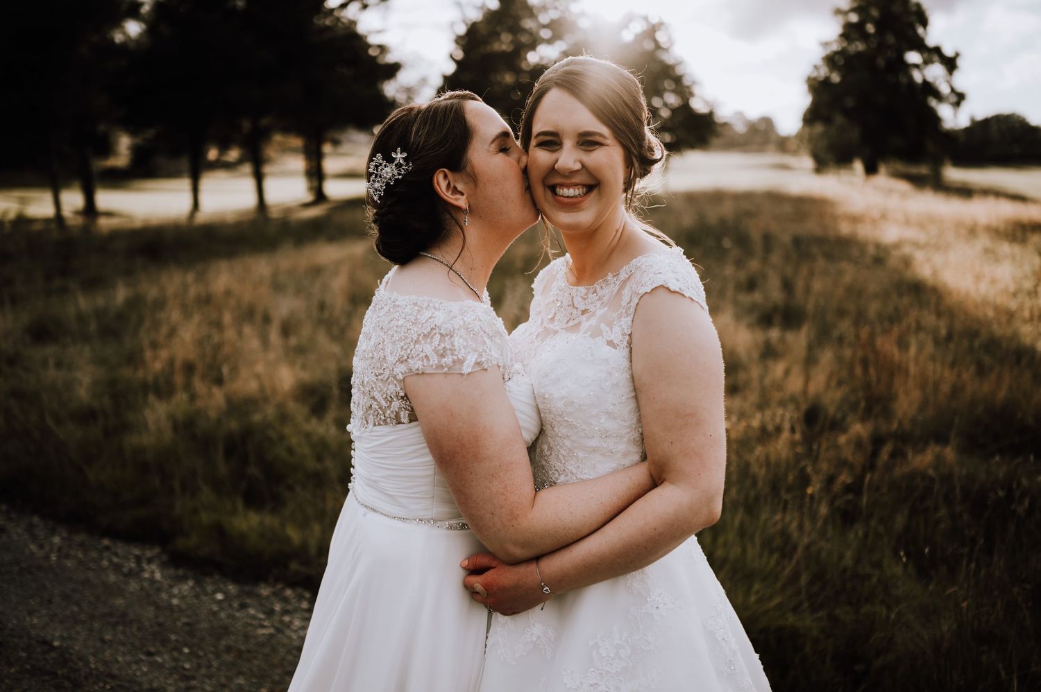 Aberdeen Wedding Photography. Intimate wedding moment captured in natural lighting with rustic outdoor backdrop.