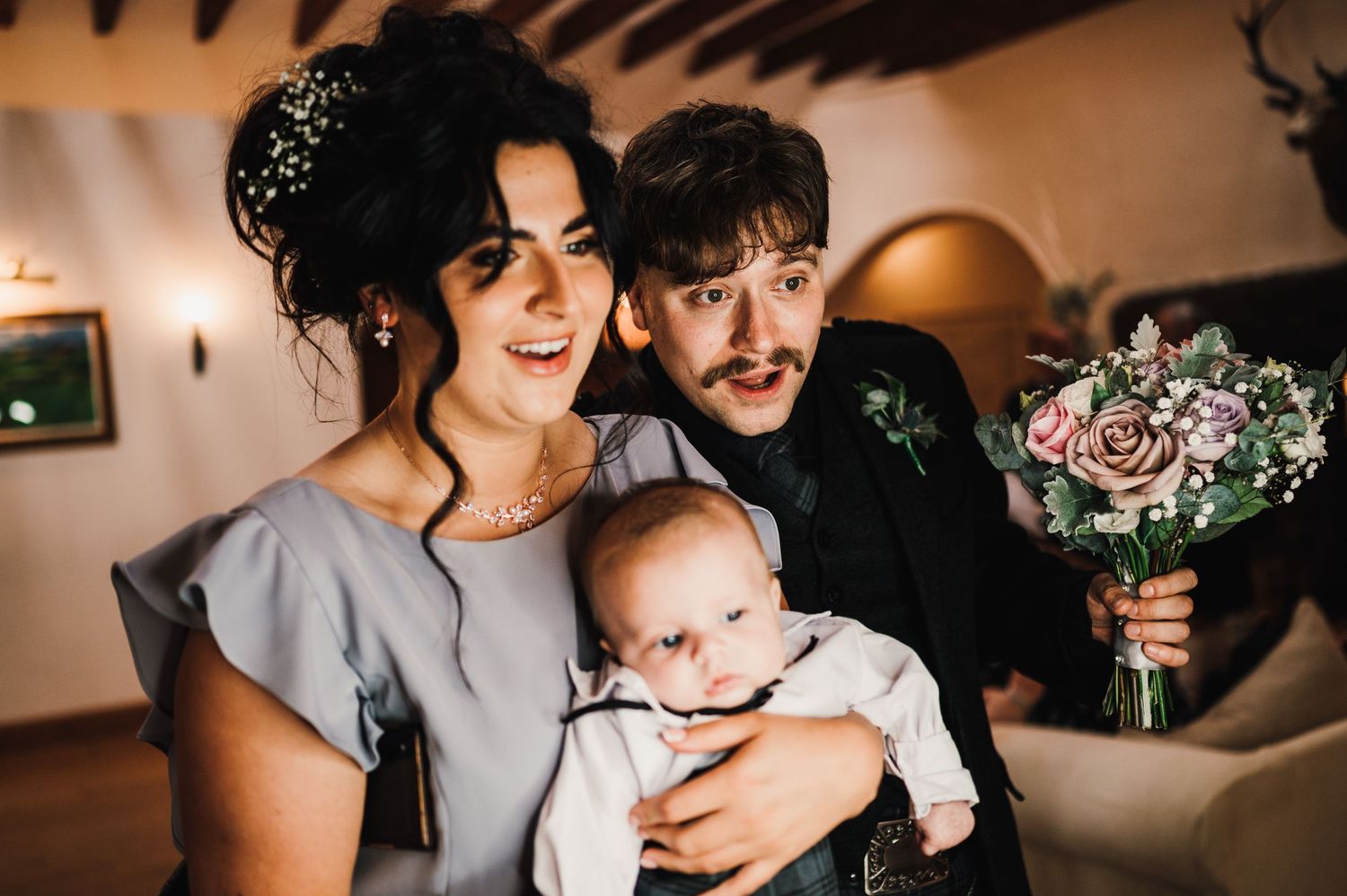 Joyful wedding reception moments captured in warm indoor lighting.