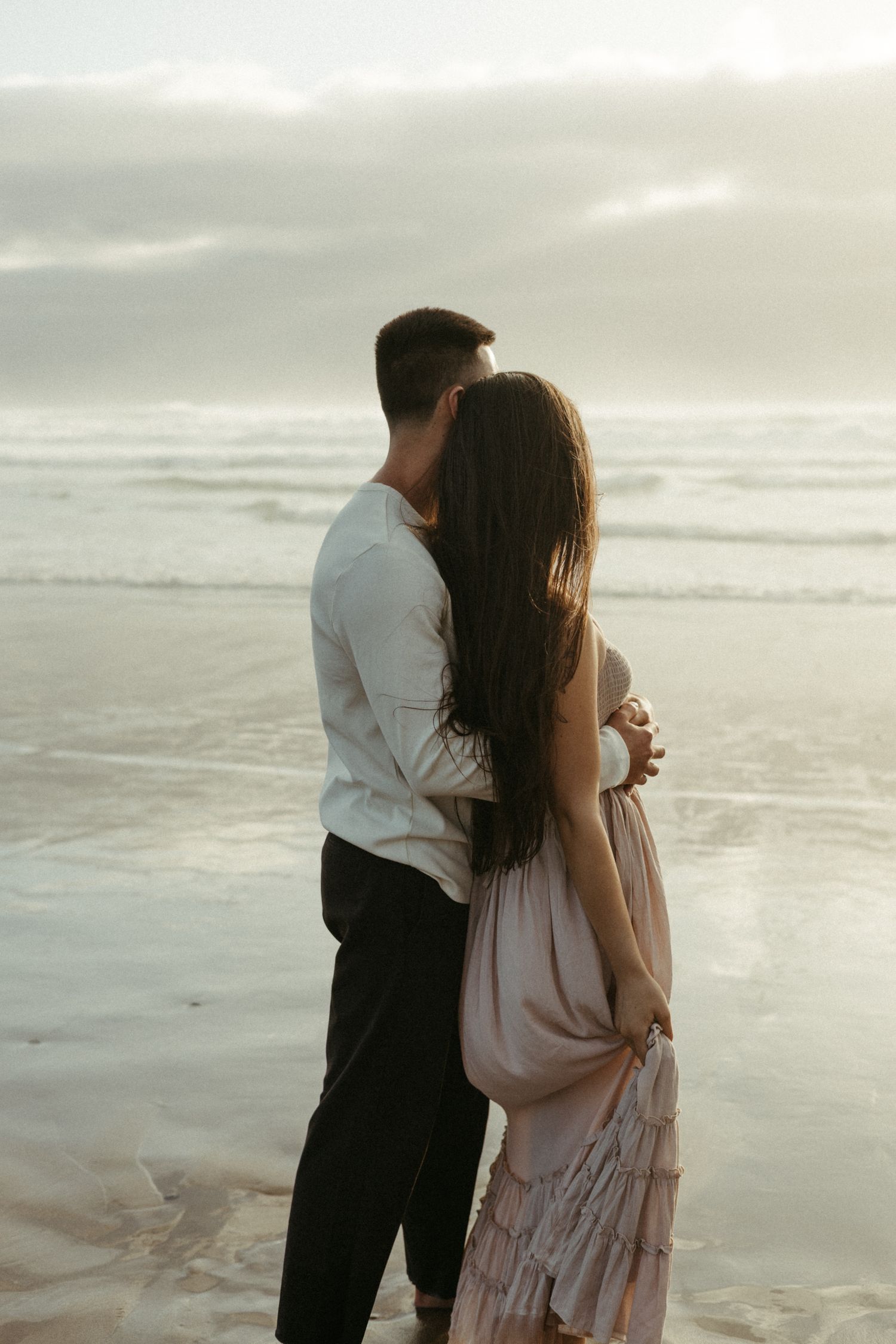 Oregon wedding photographer lincoln city couple beach session golden hour.
