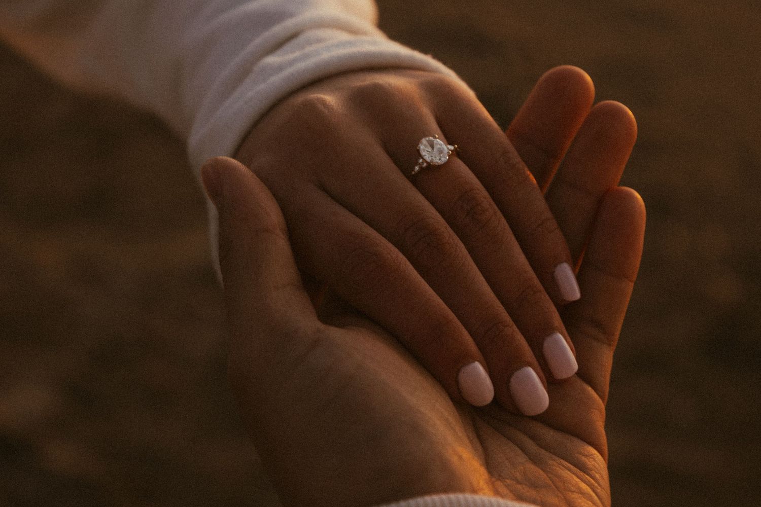 Close up ring shot from couples engagement photoshoot in Lincoln City, Oregon.