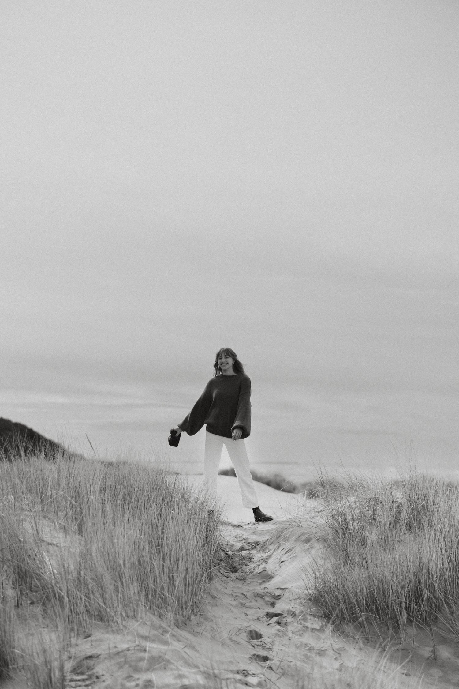 Portland intimate wedding and elopement photographer Andi Rane with camera