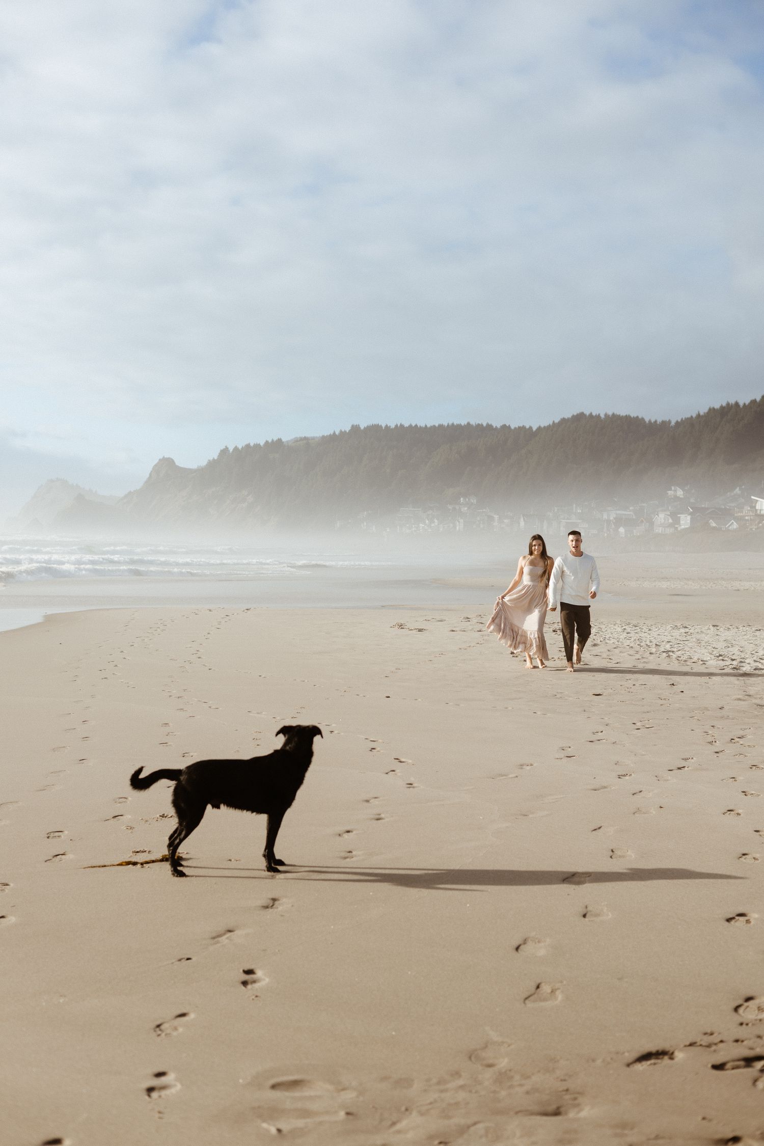 Portland wedding photography at Oregon Coast for family session with couple and dog.