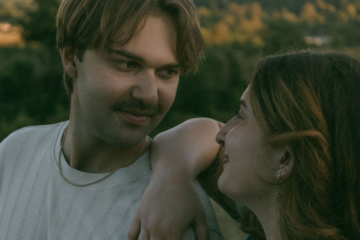 Detail close up of couple gazing into eachothers eyes for a moody documentary style image captured by Oregon Photographer Andi Rane Photo.