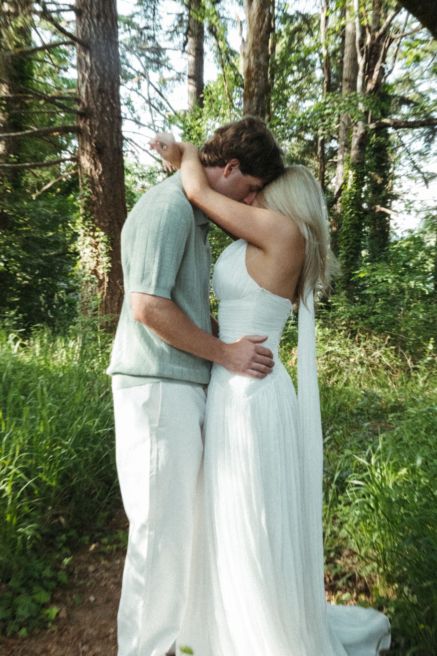 Couples embrace golden hour forest session with Portland wedding photographer, Andi