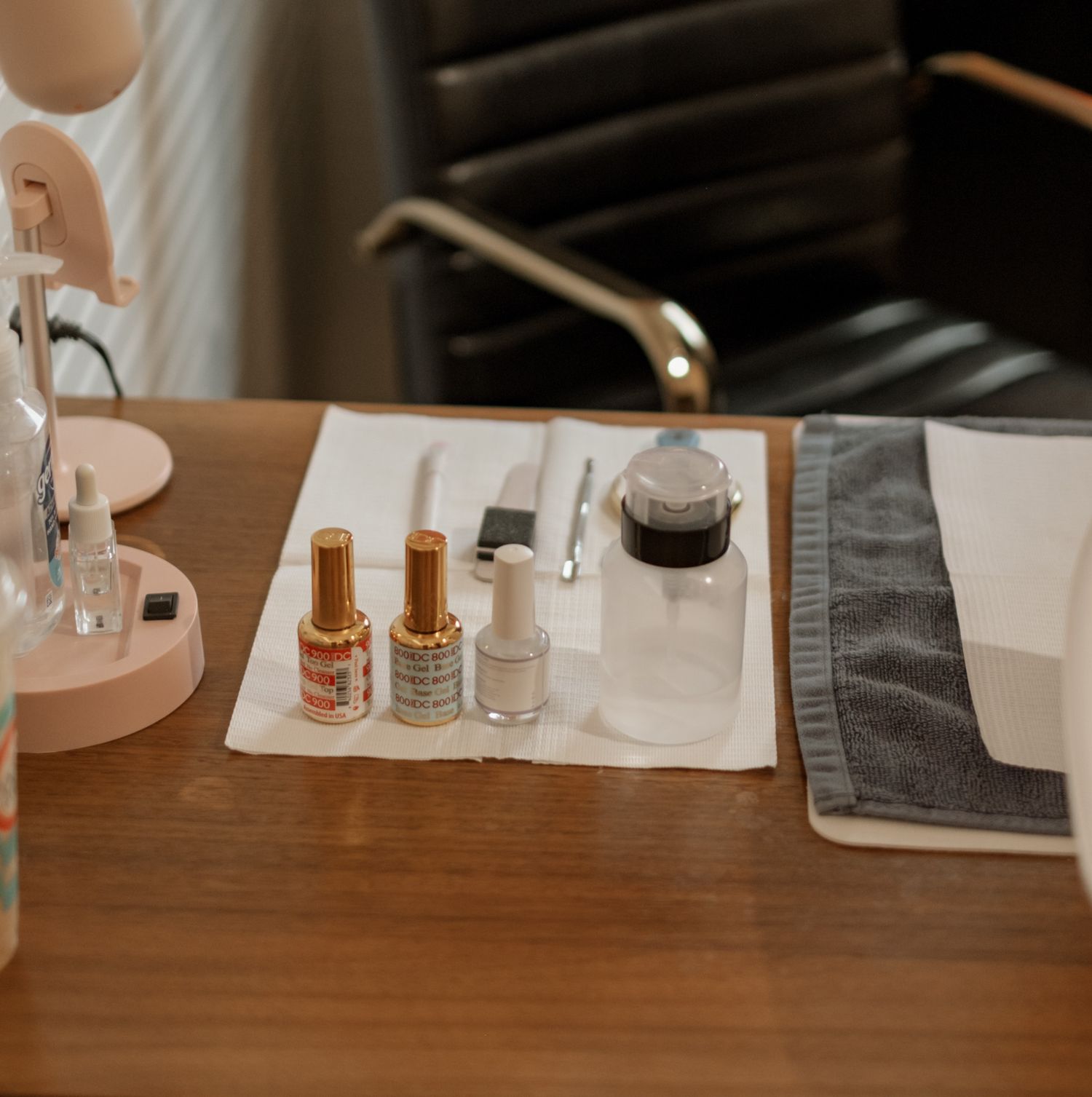 Laboratory equipment and vials arranged on a clean white surface in a scientific setting.