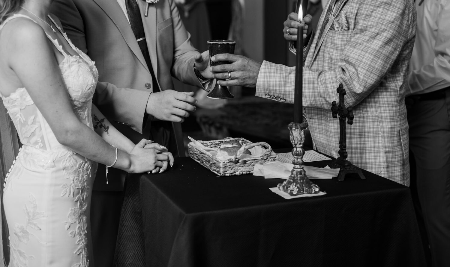 Black and white candid shots of wedding reception celebrations.