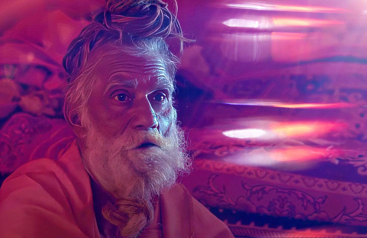 Indian sadhu with pink and purple lighting effects.