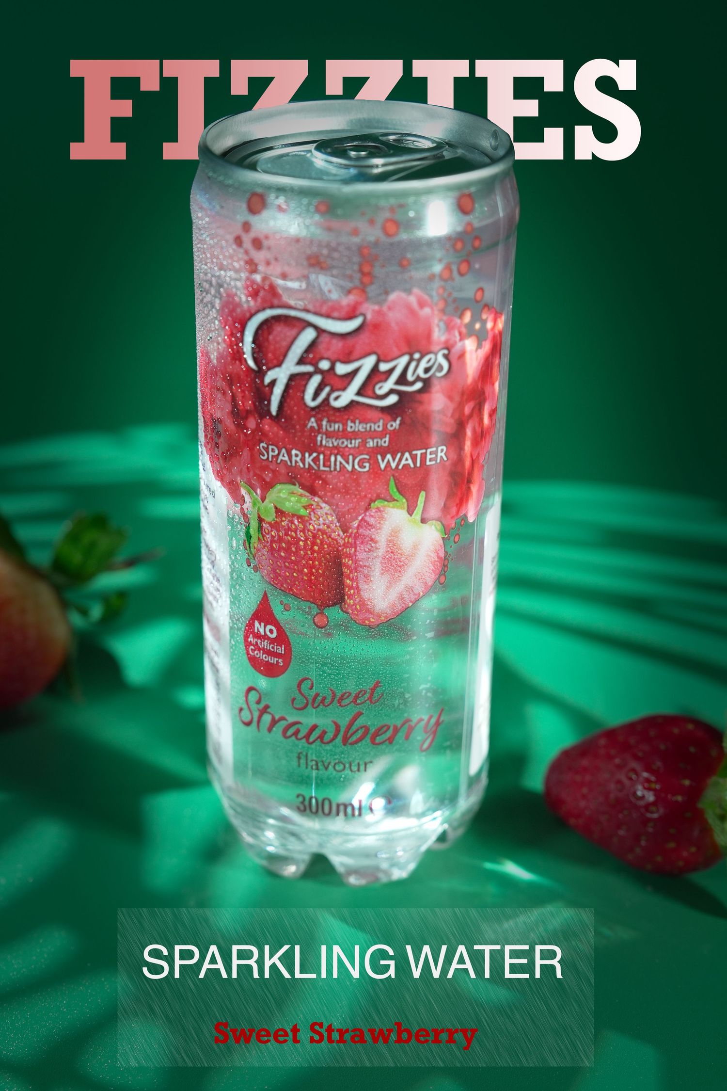 Fizzies sparkling water can in sweet strawberry flavor against green background.