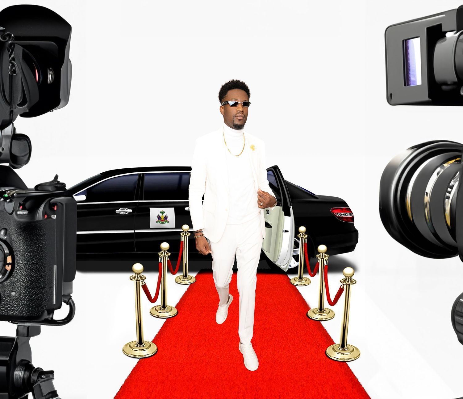 Man in an all-white suit and sunglasses walks a red carpet toward cameras with a black limousine behind him.