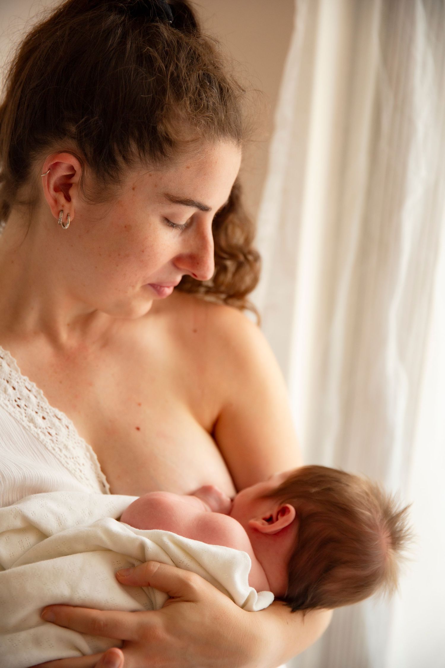 natural light newborn photography at home in Hills District
