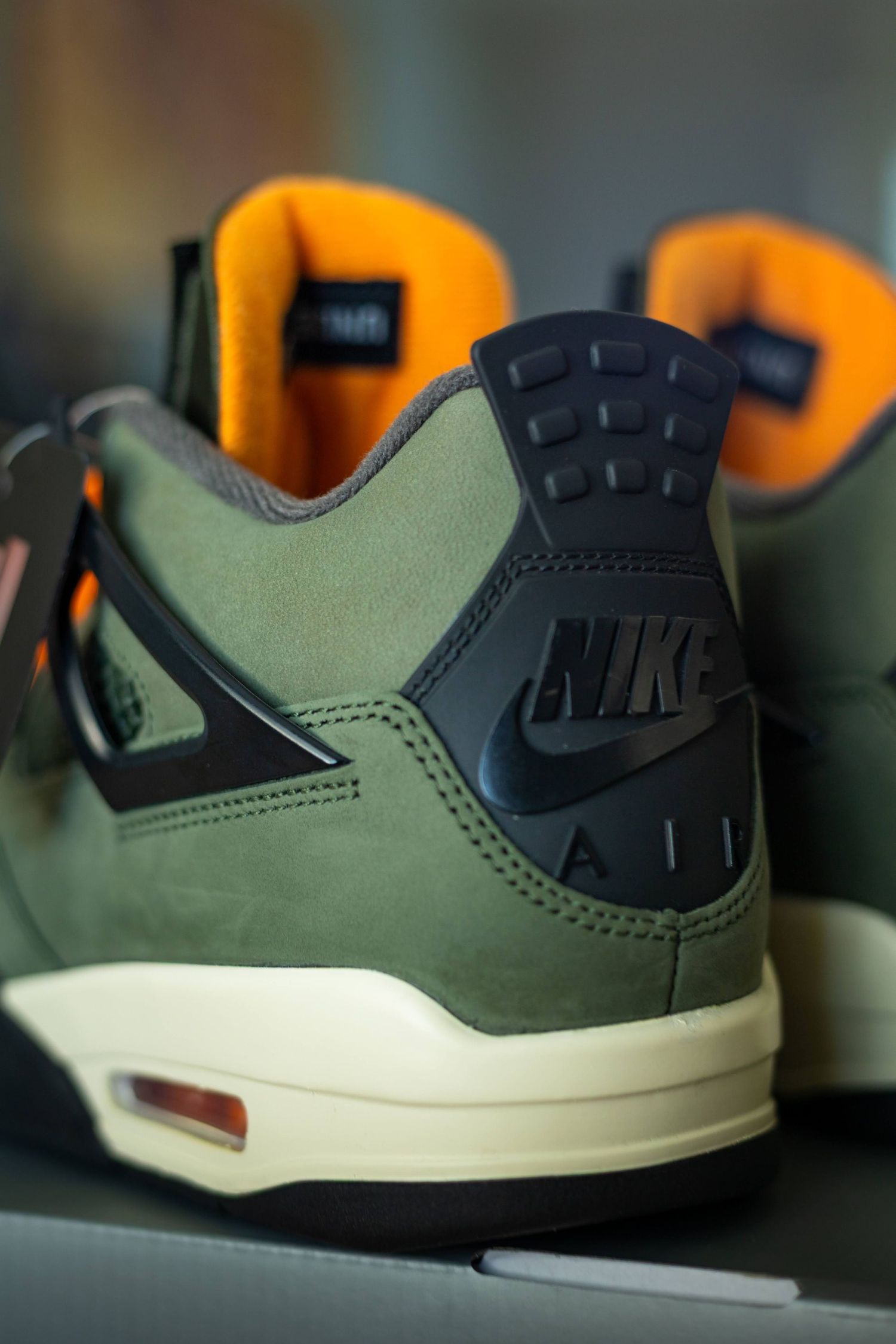 undefeated x jordan 4 heel tab