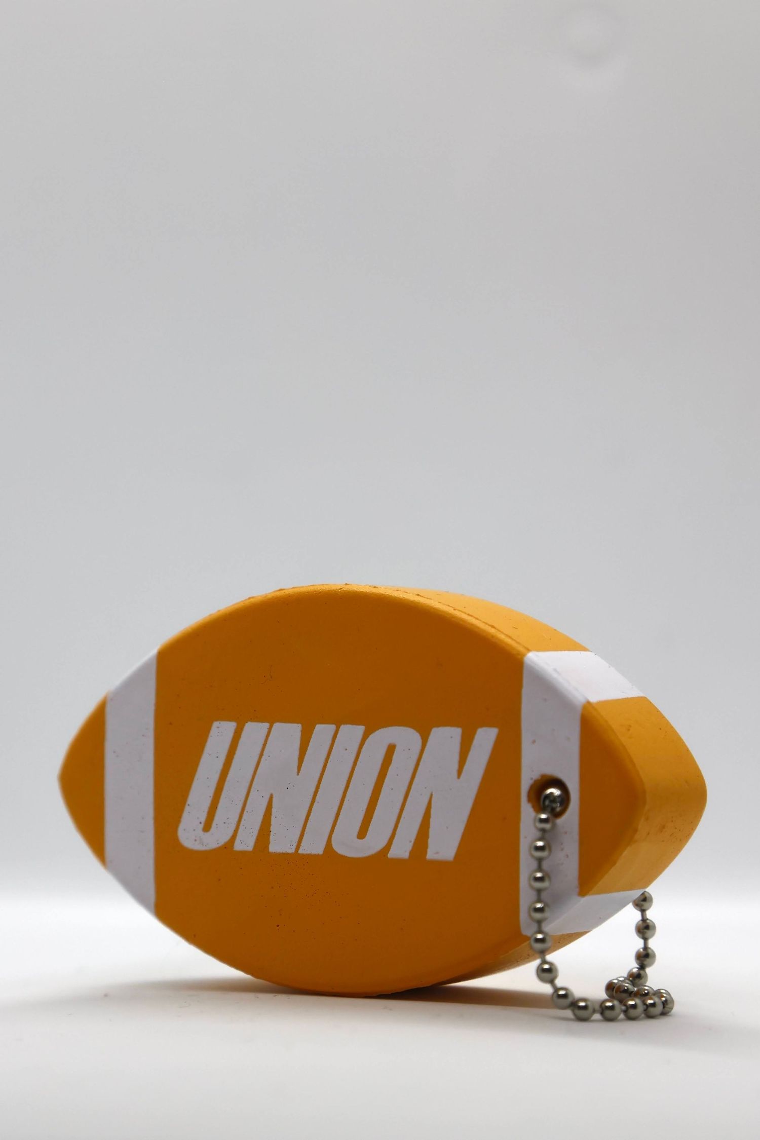 union x nike football keychain
