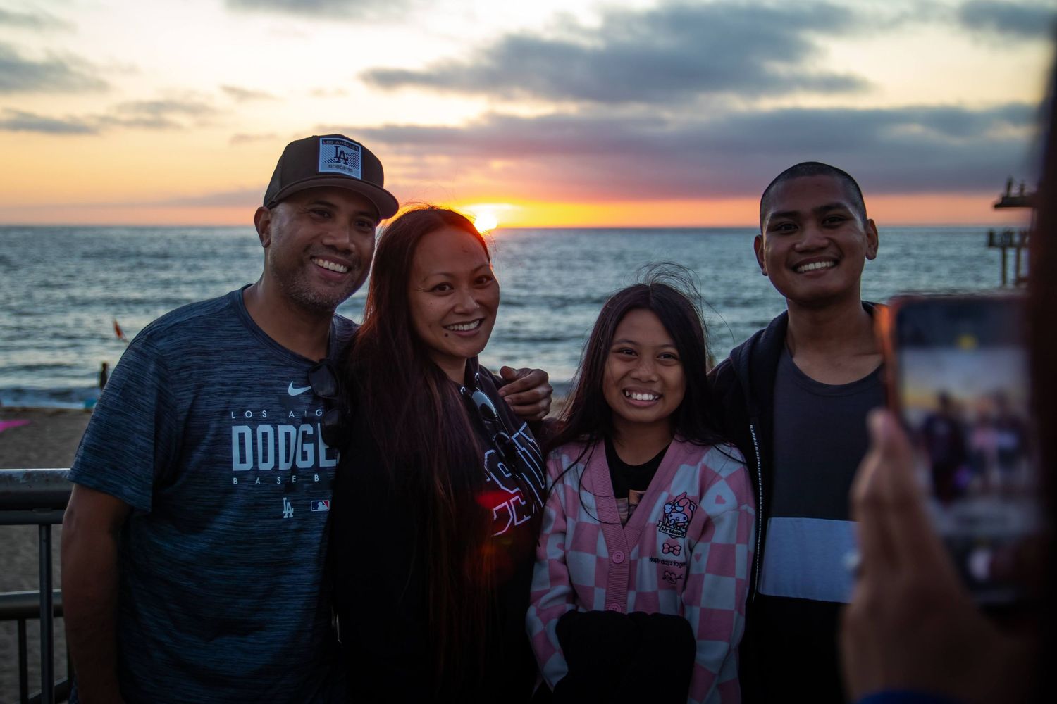 family photo at the beach behind the scenes