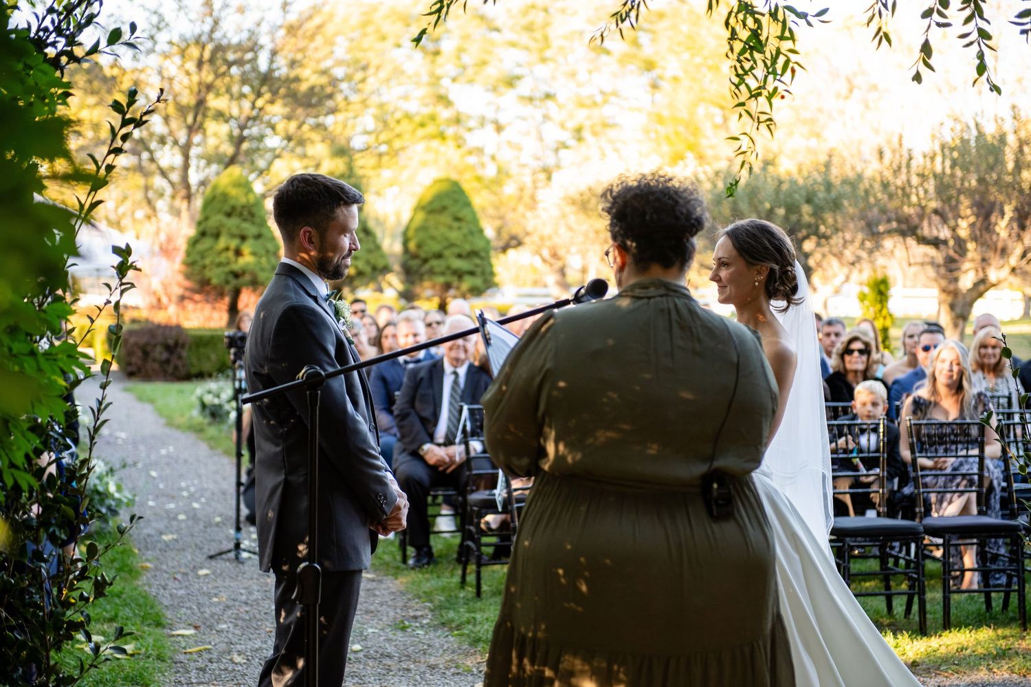 Sunset wedding reception at John Joseph Inn, Groton, NY. Light and airy outdoor ceremony photography by Allison Mott