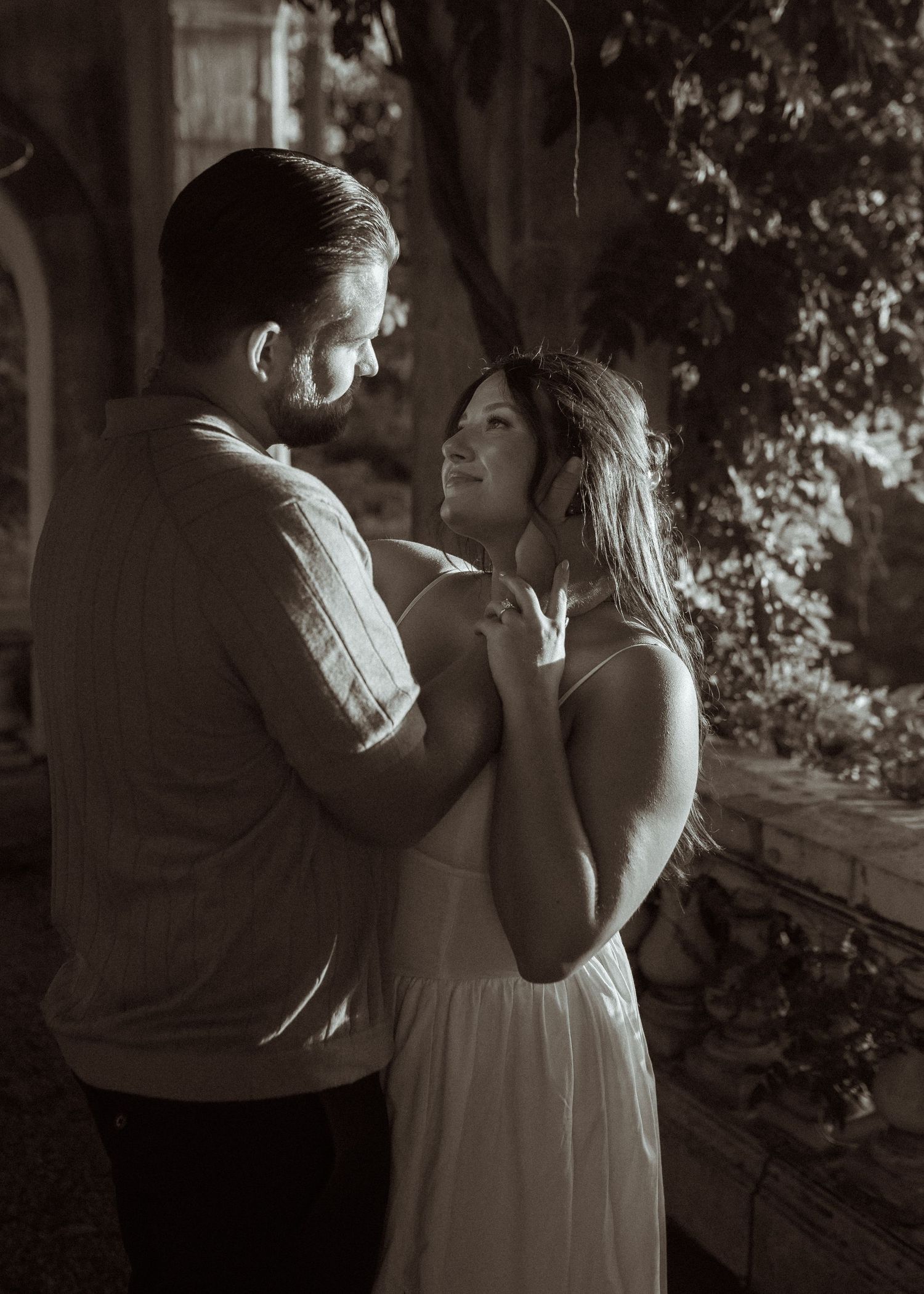 A romantic black and white photo sequence showing an intimate dance moment.