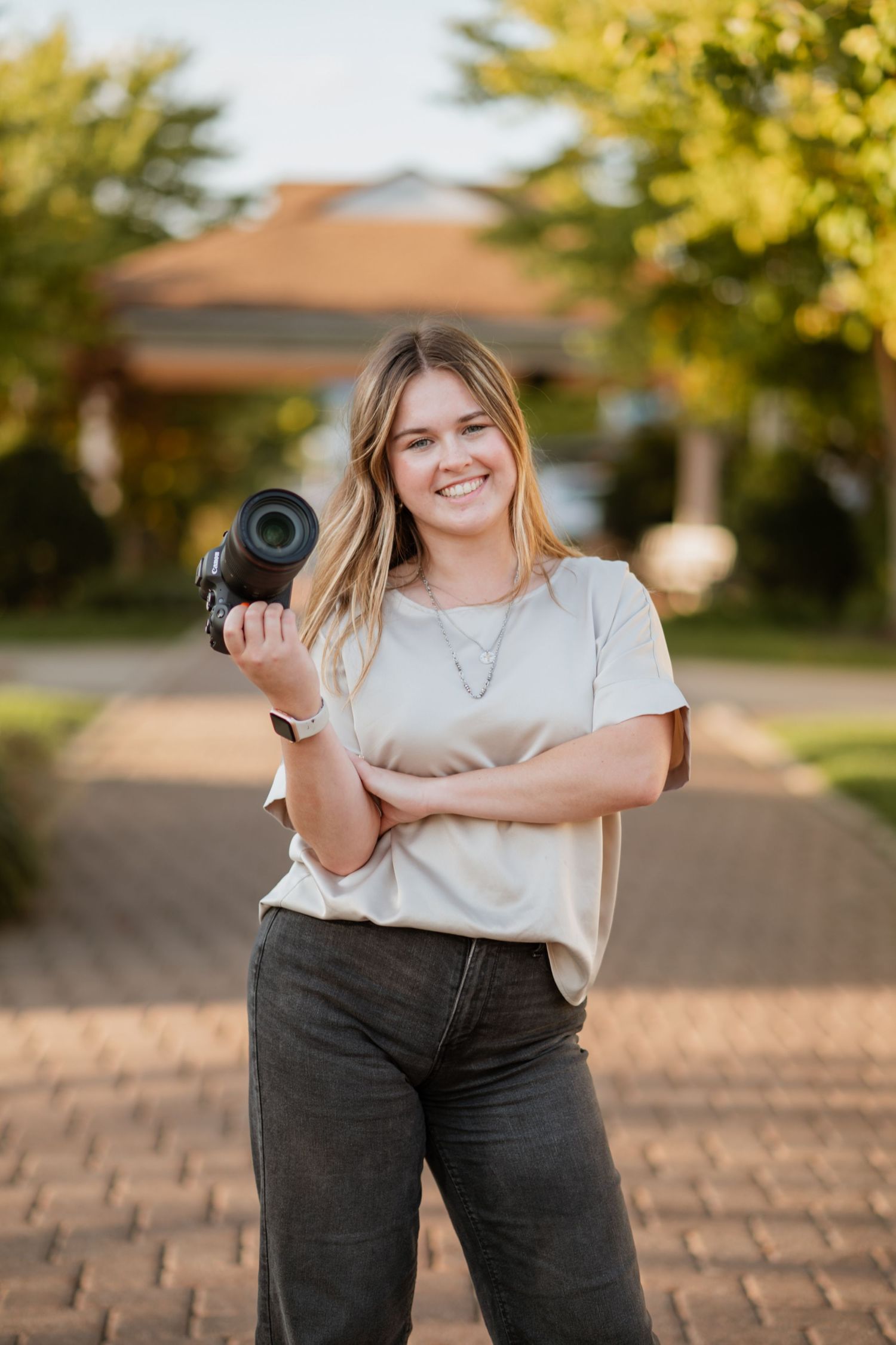 headshot photo of photographer & owner of CJ Creations, Carly Deeter.
