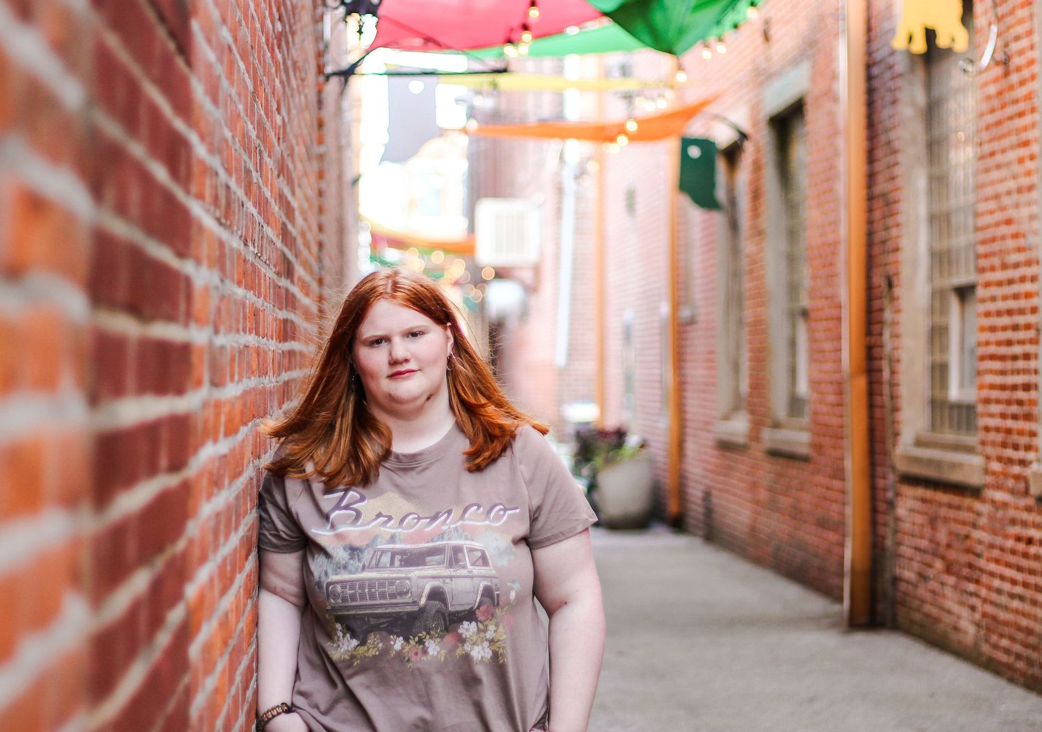 Senior girl portrait photography in Downtown Wabash, Indiana's shade sail alleywalk.