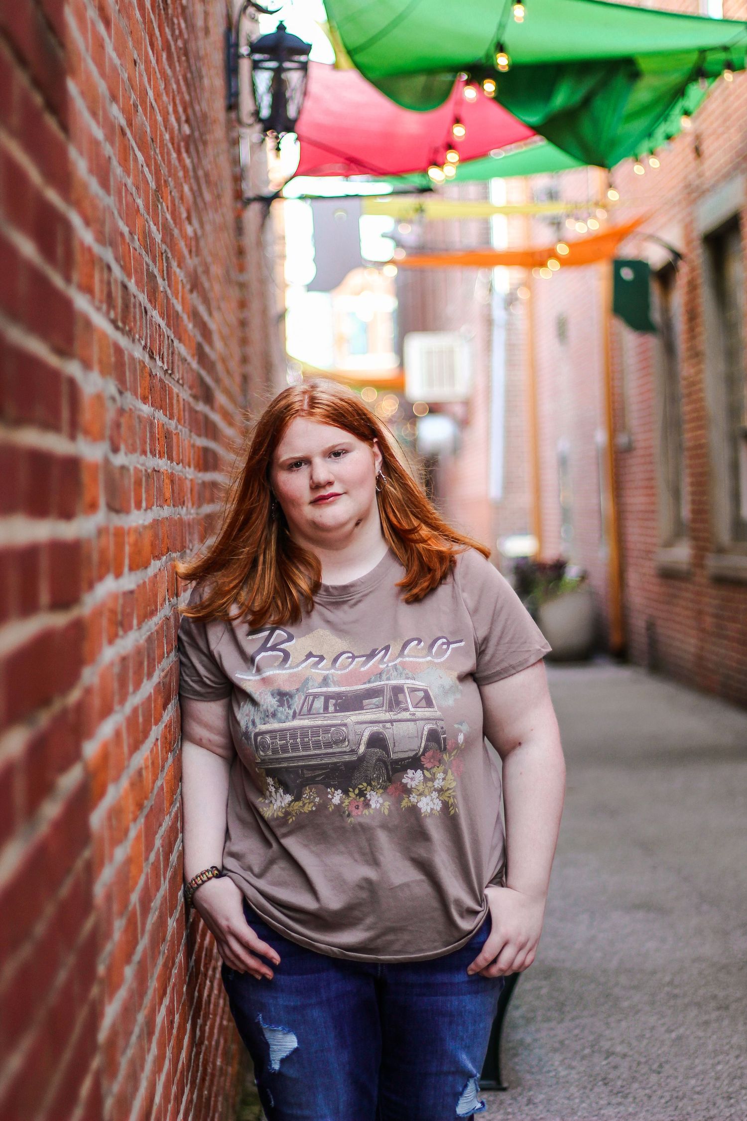 Senior girl portrait photography in Downtown Wabash, Indiana's shade sail alleywalk.
