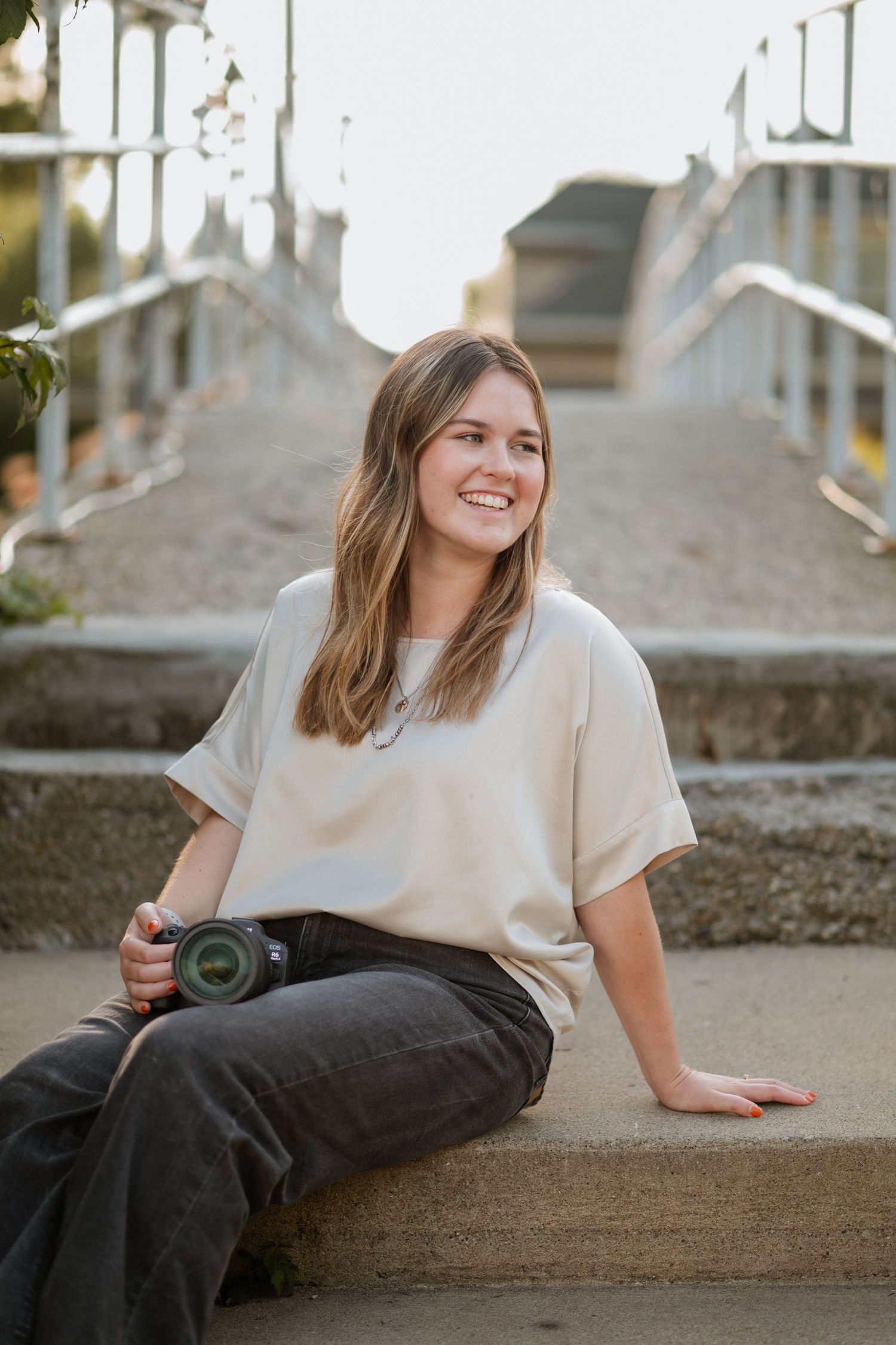 headshot photo of photographer & owner of CJ Creations, Carly Deeter.