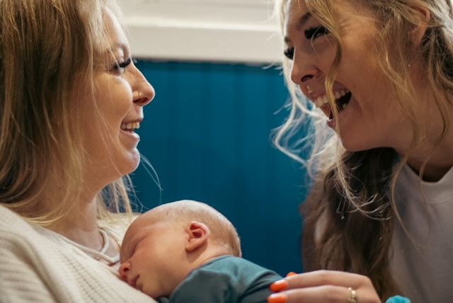 Mom, Auntie, and Newborn.