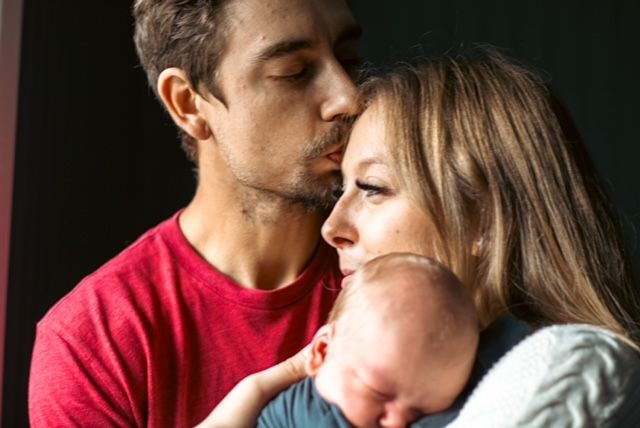 Newborn with parents.