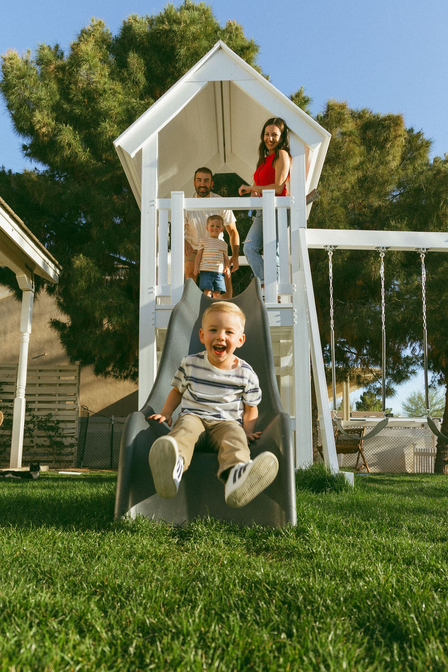 family playing on the playground
