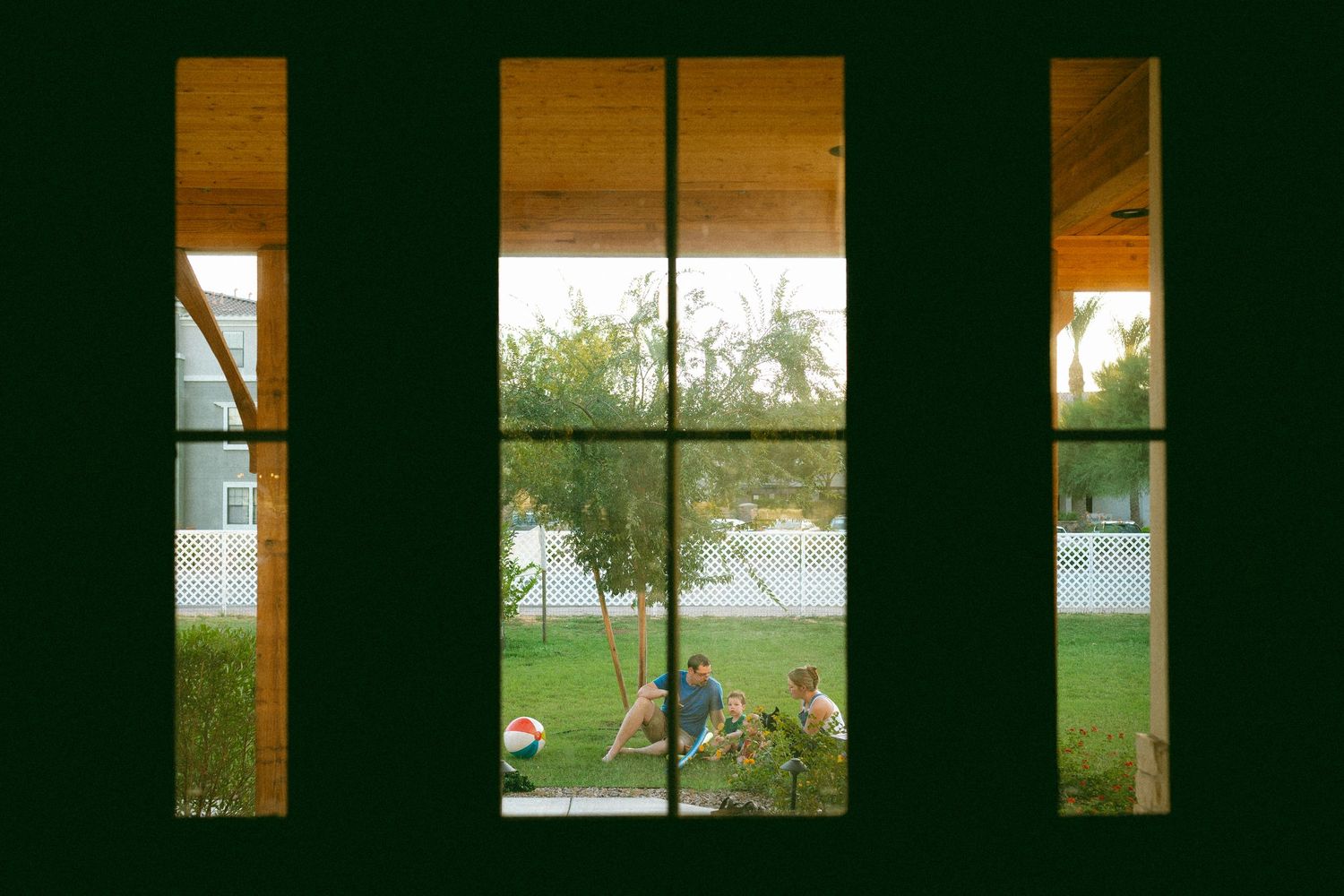 family playing in the front yard
