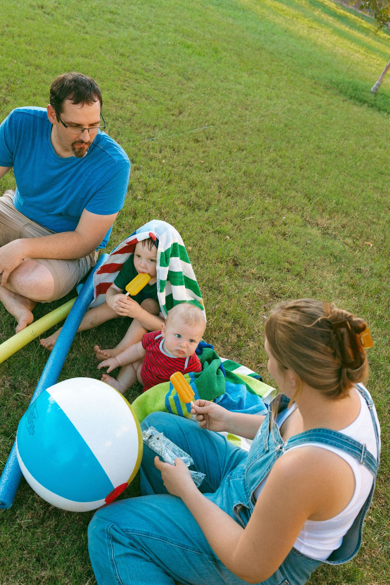 family playing in the front yard