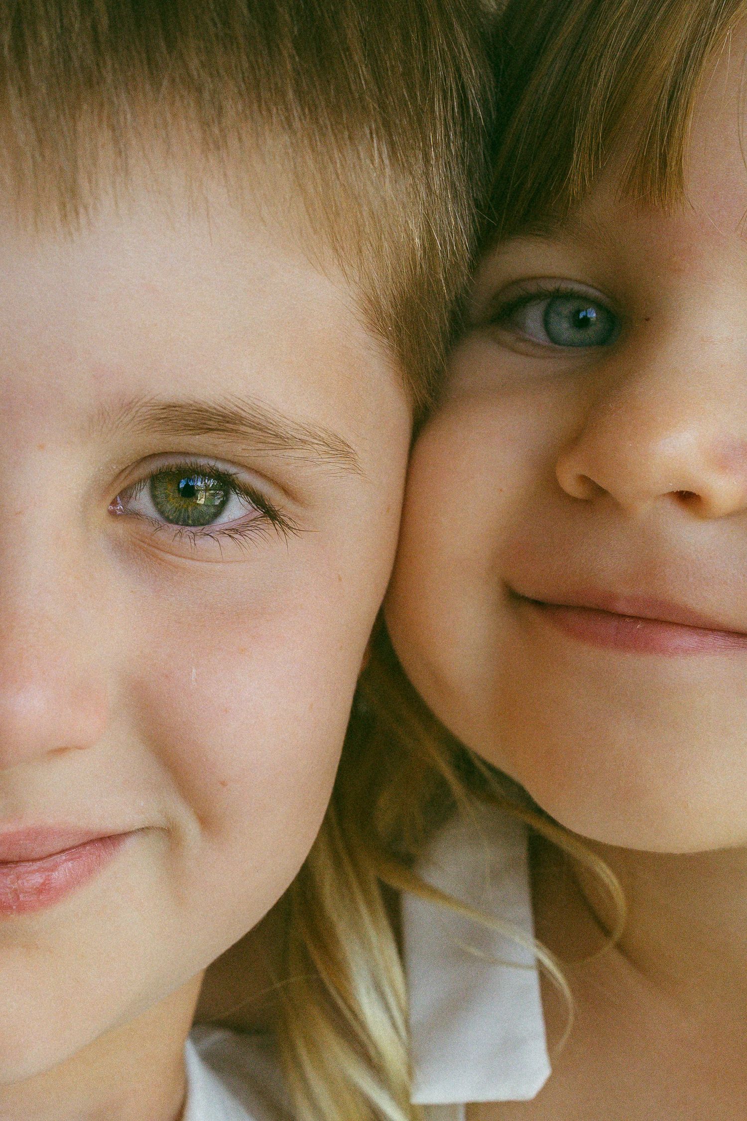 siblings posing next to each other