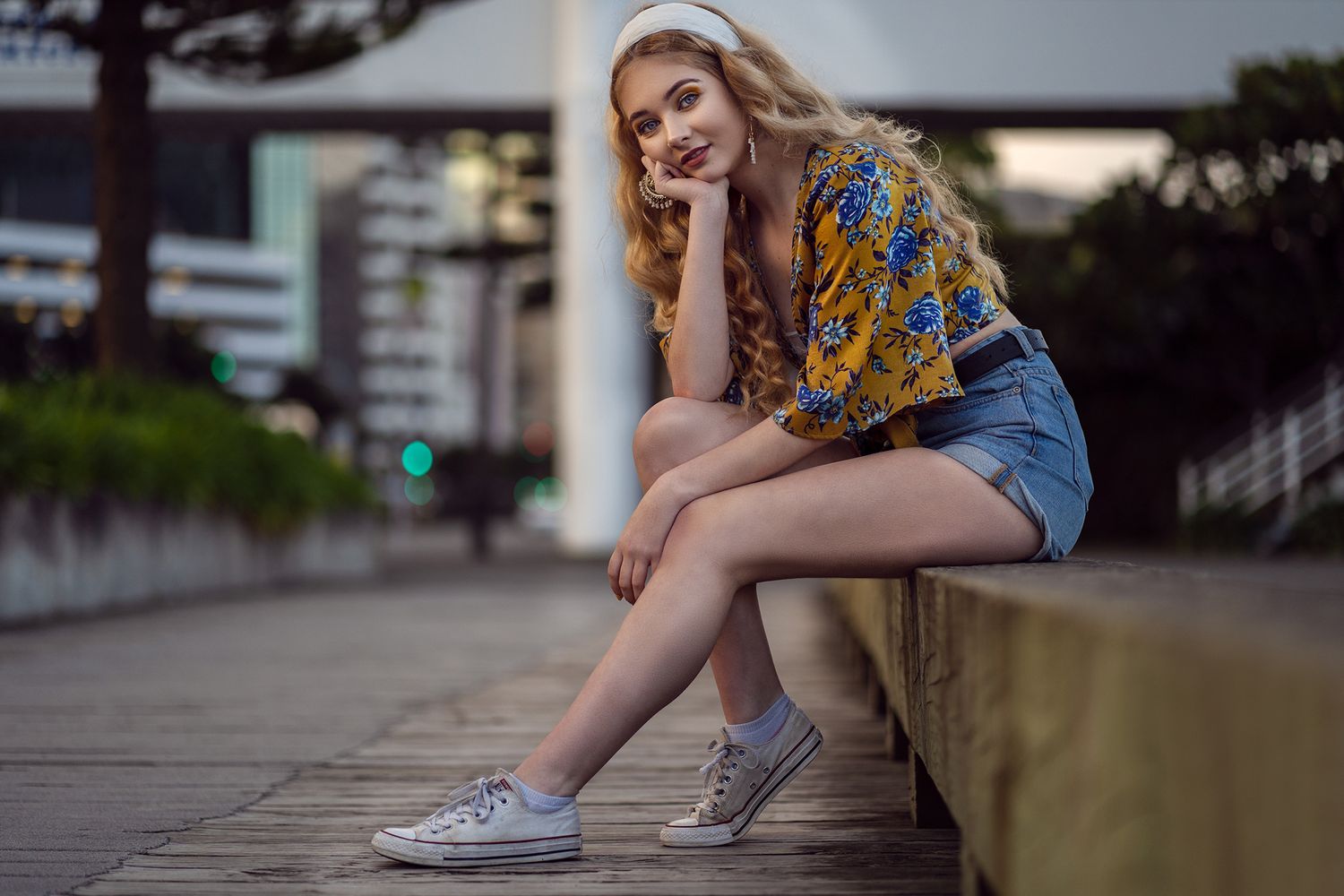 Urban fashion shoot featuring casual summer outfits and sneakers.