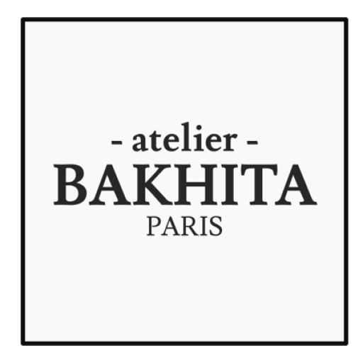 Elegant minimalist text logo for 'BAKHITA' atelier in Paris with rectangular frame.