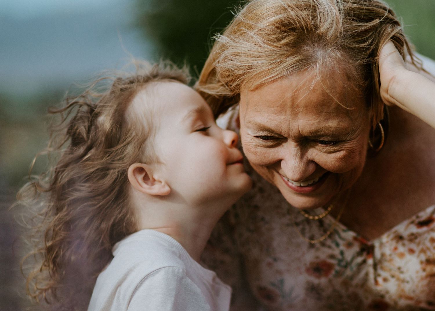 Intimate photos capturing loving moments and embraces in warm sunset lighting.