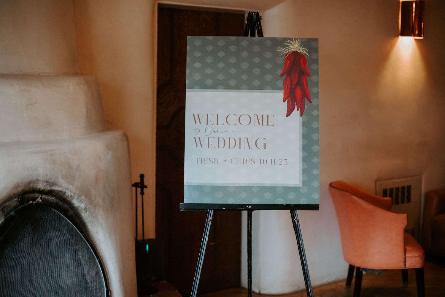 Welcome sign and decorative elements for an elegant wedding reception setup.