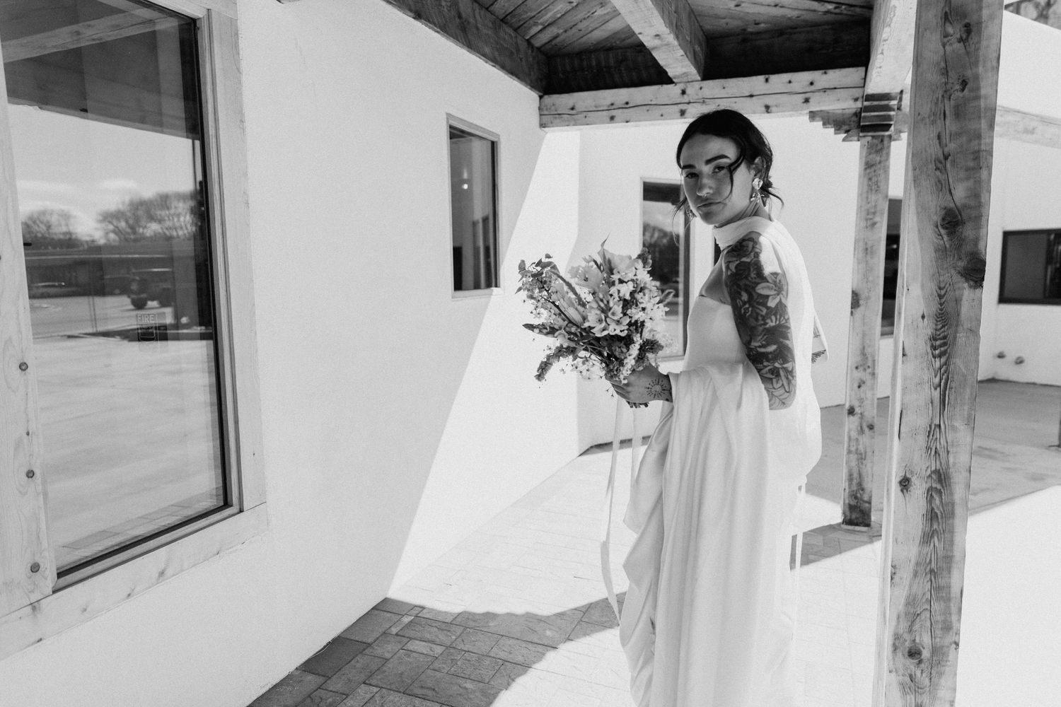 Black and white architectural shots of a rustic building with wooden beams.  Shot in Taos, NM by Siouxzen Kang