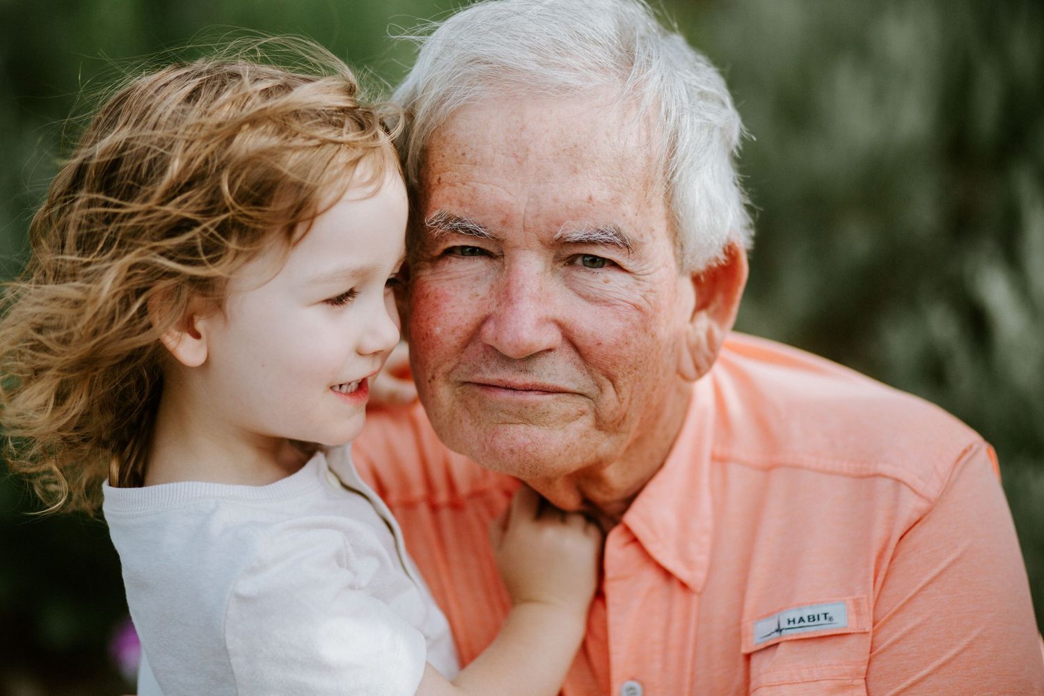 Heartwarming photos capturing tender moments between generations in an outdoor setting.