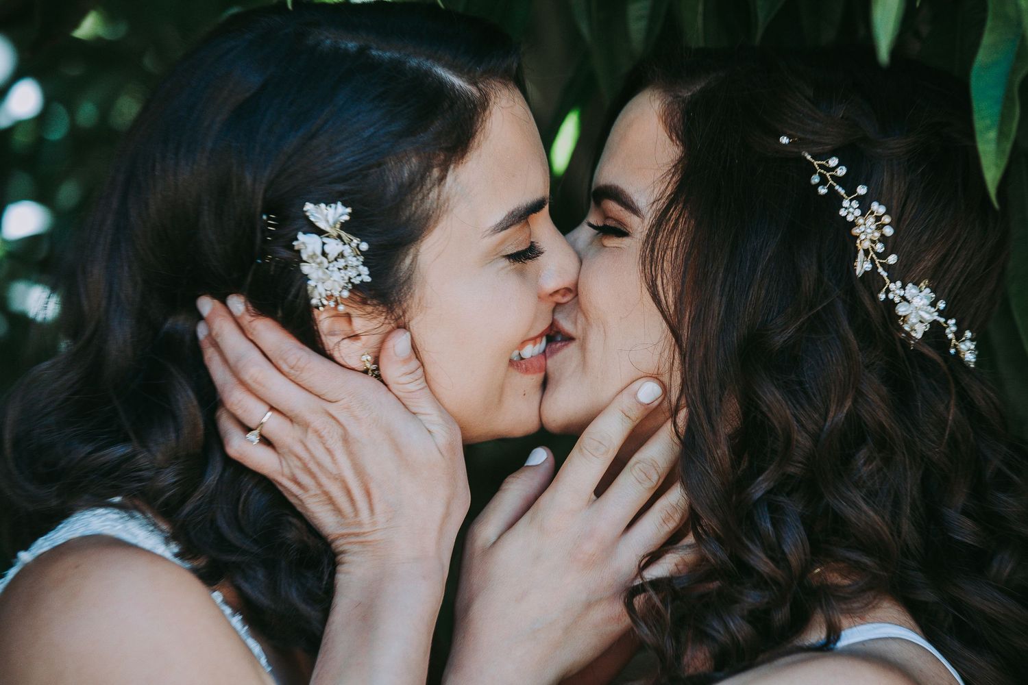LGTBQ+ Romantic garden wedding scene with lush greenery and natural lighting shot in Los Angeles, CA by Siouxzen Kang