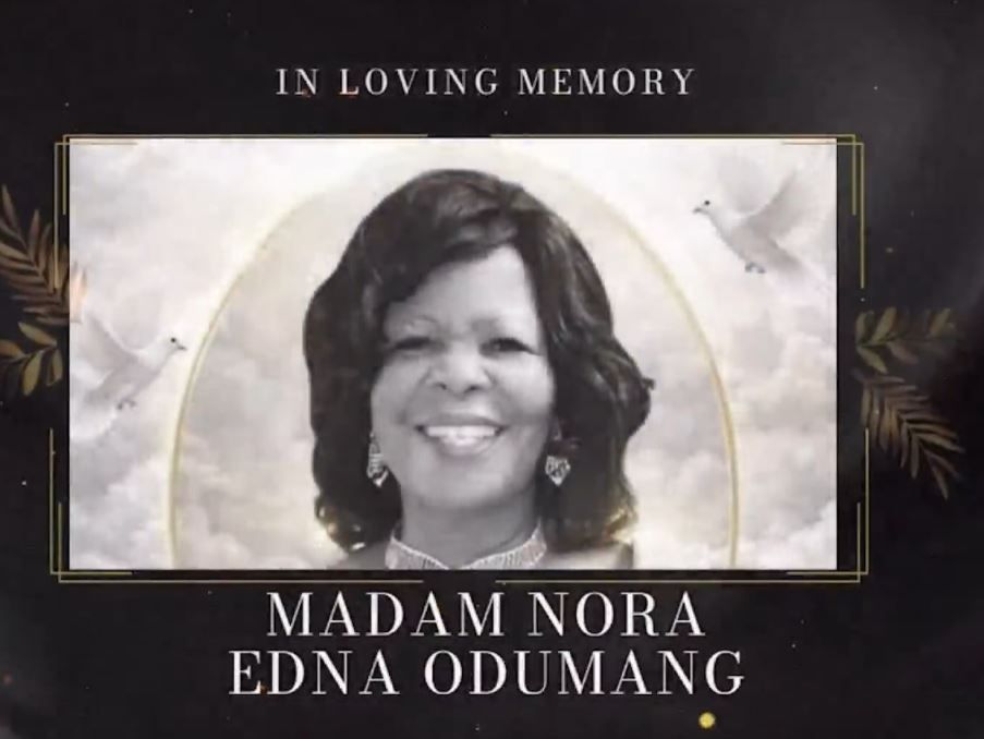 In Loving Memory tribute graphic for Madam Nora Edna Odumang with portrait photo and white doves.