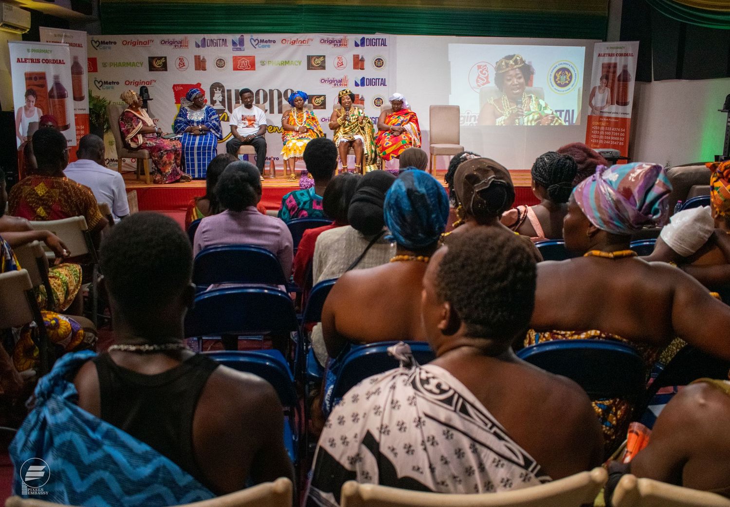 Audience attending a cultural conference panel discussion in Ghana.