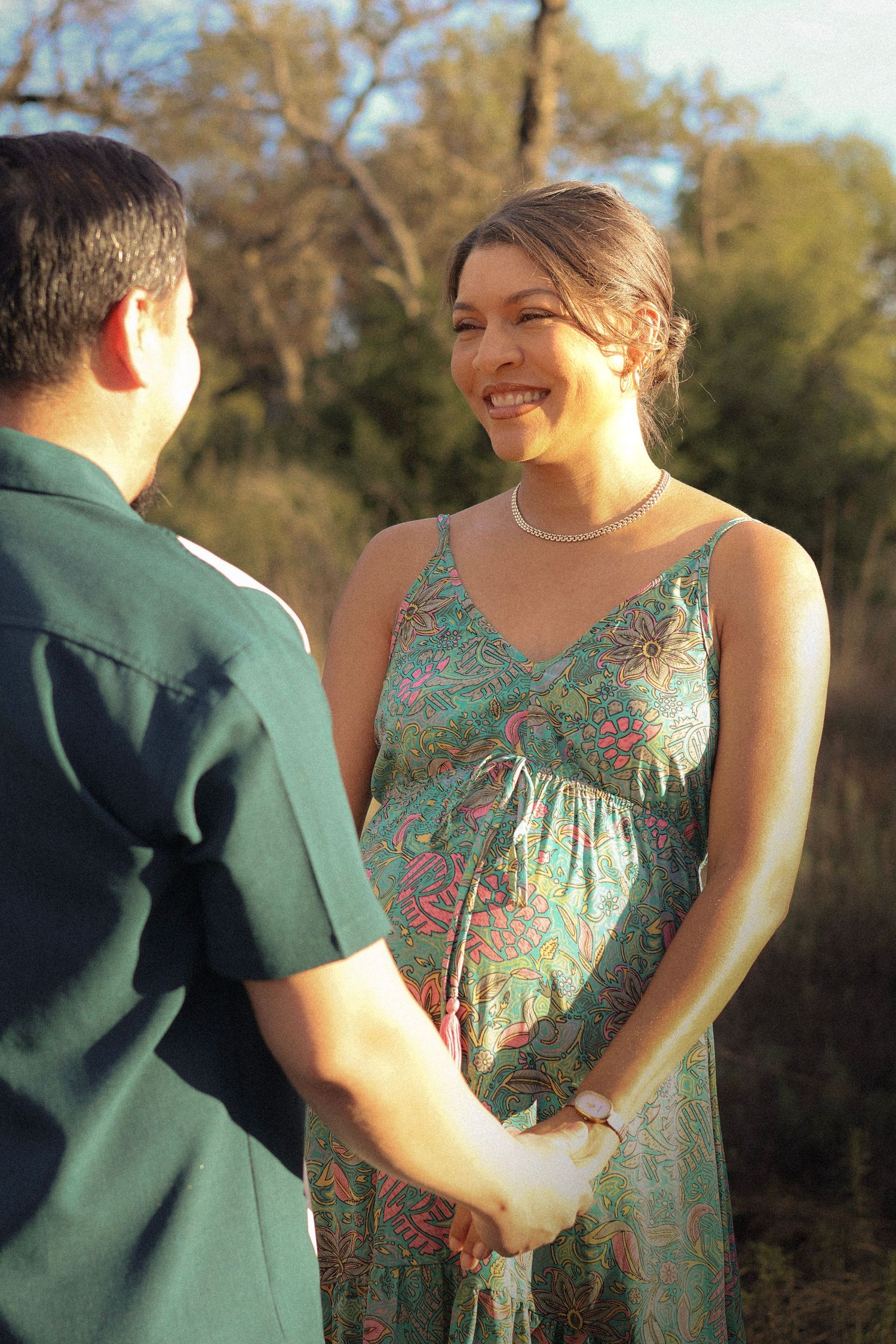 couple laughing during golden hour in Menifee